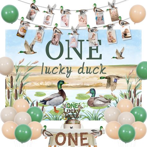 PRICES MAY VARY. Mallard Duck 1st Birthday Decorations: Package includes 15 x latex balloons 12 inches, 1 “ONE Lucky Duck” cake topper, 1 “ONE” high chair banner, 1 “ONE lucky duck” backdrop 3.3*4.9ft, 1 mallard duck photo banner and 2 white ribbons 33ft. Duck Theme Backdrop: The self-designed “ONE lucky duck” backdrop is lightweight, and can be a eye-catching photography background to your party. The printed words “ONE lucky duck” means that it will bring luck to your baby boy, the mallard duck Duck Hunting Themed 1st Birthday, One Lucky Duck First Birthday Party, One Lucky Duck Birthday Theme, Birthday Decorations For 1 Year, One Lucky Duck Smash Cake, Babys First Birthday Themes, Duck Backdrop, Duck Themed 1st Birthday, Boy 1st Birthday Themes