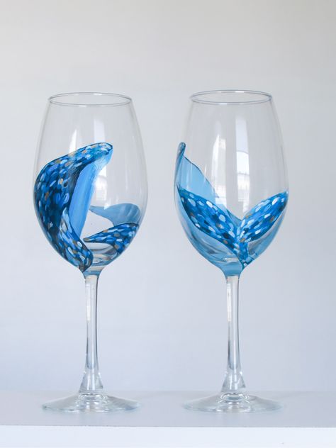 This hand painted whale wine glass set is sure to bring the magic of the ocean to your mermaid home. Mermaid Wine Glasses, Hand Painted Wine Glasses Diy, Wine Glasses Painted, Diy Wine Glasses Painted, Magic And Mystery, Blue Wine Glasses, Wine Glass Designs, Diy Wine Glasses, Wine Painting