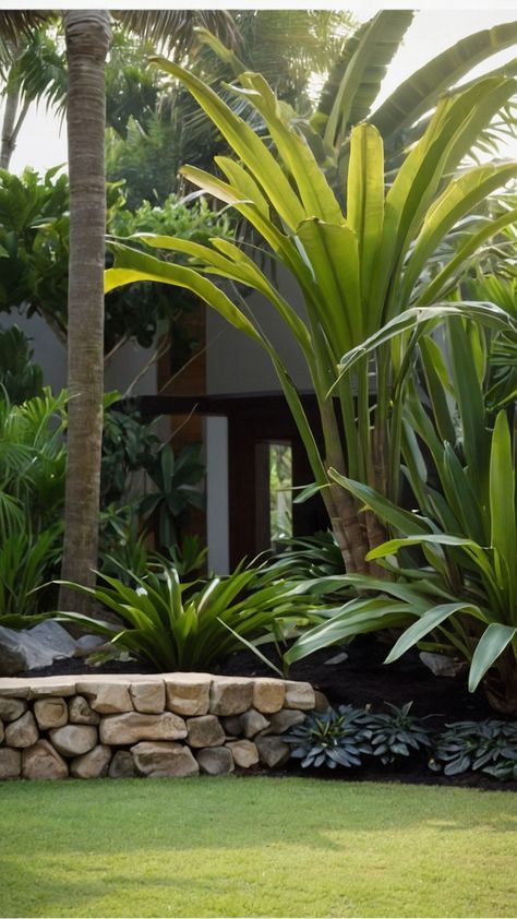 Discover stunning tropical landscape design ideas for your modern garden with Balinese garden plans and backyard ideas From front yard entrance styles to backyard and small full sun paradises create a lush minimal oasis with our expert tips Front Yard Entrance, Yard Entrance, Balinese Garden, Tropical Landscape Design, Landscape Design Ideas, Tropical Landscape, Garden Plans, Stone Path, Need A Vacation