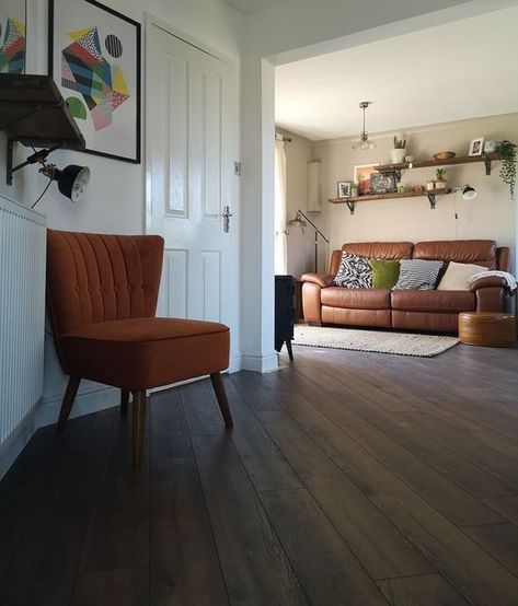 Direct Wood Flooring on Instagram: "Contrast dark flooring with splashes of colour for a contemporary look. We love this space using realistic laminate flooring with a real wood look and feel 😍 🛒 Residence Narrow - Dark Peterson Oak 👆 Free samples link in our bio! . . . . . . #LaminateFlooring #Interior #WoodFlooring #OakFlooring #ModernHome #ModernInterior #CheapFlooring #LuxuryFlooring #InteriorInspo #InteriorStyling #DecorDailyDose #HomeDecor #DIYHomeDecor #FurnitureDecor #JungalowStyle #H Dark Flooring, Dark Oak Flooring, Dark Wooden Floor, Direct Wood Flooring, Cheap Flooring, Oak Laminate Flooring, Laminate Colours, Dark Floors, Luxury Flooring