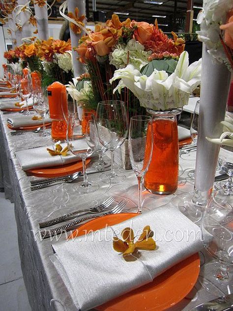 images of wedding reception tables mocha & orange | orange and silver wedding table Orange Ideas, Wedding Reception Tablescapes, Silver Party Decorations, Anniversary Plans, Silver Wedding Decorations, Dinner Centerpieces, Orange Wedding Colors, Vowel Renewal, Orange And Silver