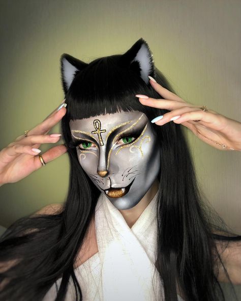 Bastet (bȝstt) 🐈‍⬛ is the Egyptian goddess of the home, domesticity, women's secrets, cats, fertility. She protected the home from evil… | Instagram Evil Cat Makeup, Bastet Makeup, Egyptian Makeup Goddesses, Edc Makeup, Rhinestones Makeup, Egyptian Makeup, Sand Cat, Rhinestone Makeup, Evil Cat