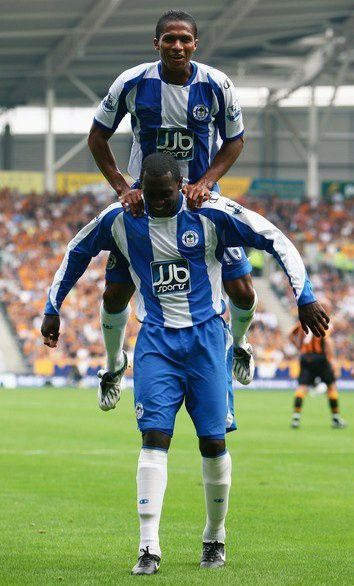 Wigan Athletic FC Great Pic Of Antonio Valencia & Emile Heskey Wigan Athletic, Great Pic, Captain America, Valencia, England, Collage, Pins, Quick Saves