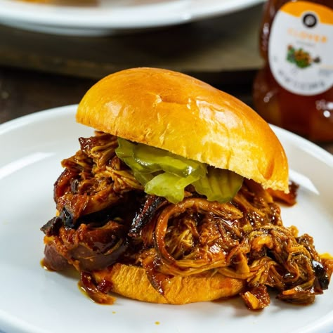 Slow Cooker Hot Honey Chicken- a sweet and spicy shredded chicken that makes a great sandwich. The chicken is wonderfully juicy. Hot Honey Chicken Sandwich, Honey Chicken Sandwich, Spicy Shredded Chicken, Hot Honey Chicken, Spicy Southern Kitchen, Chicken Sandwich Recipes, Southern Kitchen, Hot Honey, Crockpot Slow Cooker