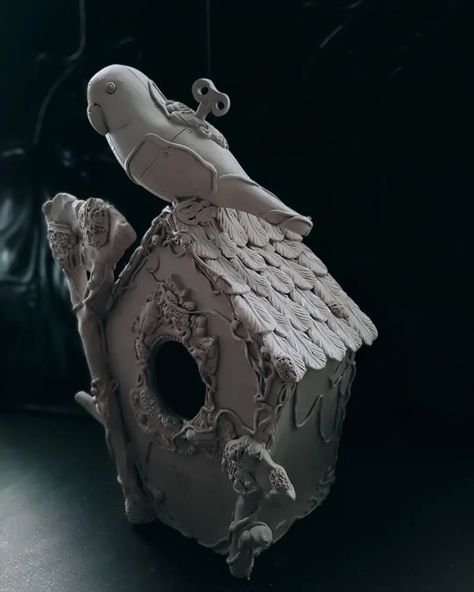 Ceramic bird house sculpture in progress Www.janellepetersonceramics.com #australianartist #australianceramics #pottery #parakeets #birdhouse #CREmerging #ceramicbird #birdsculpture #witchyvibes #cottagecore #functionalceramics #handbuilding #pottery #handbuiltceramics #claysculpture #potteryworkshop #potterytechniques #moreceramiclessplastic #makermovement #instaceramic #ceramiclicious #potterylife #ceramiclife #claylife #potteryclay #potterylove #ceramicartist #ceramica #ceramique Bird House Ceramics, Bird Feeder Ceramic, Ceramic Peacock Sculpture, Handbuilding Pottery, House Sculpture, Raven/crow Sculptures And Pottery, Ceramic Birdhouse Uncommon Goods, Ceramic Birdhouse, Pottery Workshop