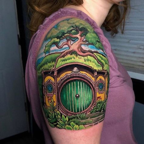 Double Diamond Tattoos on Instagram: "Super bright Shire tattoo from the Hobbit done by: John Black check out more of his work @johnblacktat2 #ink #inked #shiretattoo #hobbittattoo #colortattoo #tattoo" Hobbit House Tattoo, The Shire Tattoo, Hobbit Hole Tattoo, Hobbit Tattoo Ideas, Light Tattoos, Slipknot Tattoo, Hobbit Tattoo, Tolkien Tattoo, Lotr Tattoo