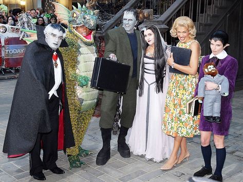 The cast paid homage to TV’s most spook-tacular family, The Munsters, in 2007: Lauer and Vieira were Herman and Lily Munster, Roker was Grandpa, Morales was son Eddie and Hoda Kotb was their “normal” niece, Marilyn. Contributor Tiki Barber went wild as the fictional family’s pet, Spot. The Munsters Halloween Costumes, The Munsters Costumes, Lily Munster Costume, Ann Curry, Halloween Costumes 2014, Halloween Camping, Top Halloween Costumes, Lily Munster, Halloween Group