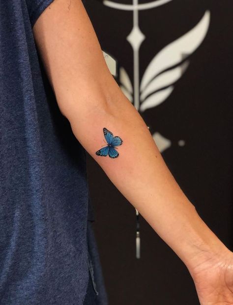 Small Blue Butterfly Tattoo - TattooLopediaTattooLopedia Small Blue Butterfly, Purple Butterfly Tattoo, Blue Butterfly Tattoo, Butterfly Wrist Tattoo, Yang Tattoo, Small Butterfly Tattoo, Butterfly Tattoos For Women, Blue Tattoo, Butterfly Tattoo Designs