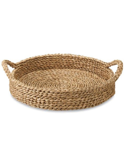 Sweeten up your moning with these artisanal finds. In this photo: A braided water hyacinth tray. It's as sturdy as it is pretty. (Onslow Tray, $39.95; crateandbarrel.com) Basket And Crate, Laura Ingalls Wilder, Trendy Living Rooms, Rope Crafts, Water Hyacinth, Rope Basket, Farmhouse Decor Living Room, Table Top Display, Crate And Barrel