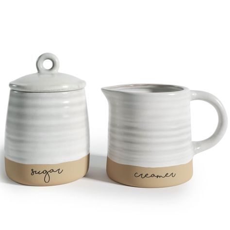 PRICES MAY VARY. Ceramic Sugar and Creamer Set - This creamer and sugar set is part of our exclusive Maribelle Stoneware Collection. With a fresh and earthy palette, this creamer pitcher and sugar dish will add an artisan-inspired style to your decor. Farmhouse-Style Decor - Serve your guests in style with these coffee sets for serving. The two-toned creamer container and sugar bowl set, with their organically crafted details, will add a farmhouse touch to your kitchen decor. Eye-catching Coffee Creamer Container, Sugar Container, Sugar Canister, Coffee Serving, Sugar Bowls And Creamers, Vintage Farmhouse Kitchen, Ceramic Pitcher, Farmhouse Style Decorating, Cream And Sugar