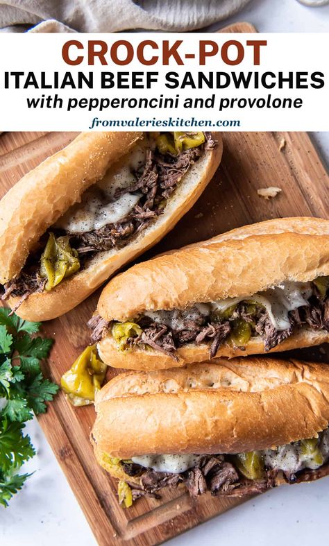 Tender, shredded Italian Beef with pepperoncini loaded on toasty sandwich rolls with melted provolone cheese. With just a few minutes of prep, you can have these comforting Crock-Pot Italian Beef Sandwiches on your menu on even the busiest of days. Beef Sandwiches Crock Pot, Slow Cooker Italian Beef Sandwiches, Crock Pot Italian Beef, Crock Pot Sandwiches, Amazing Sandwiches, Italian Roast Beef, Shredded Beef Sandwiches, Crock Pot Italian, Italian Beef Recipes