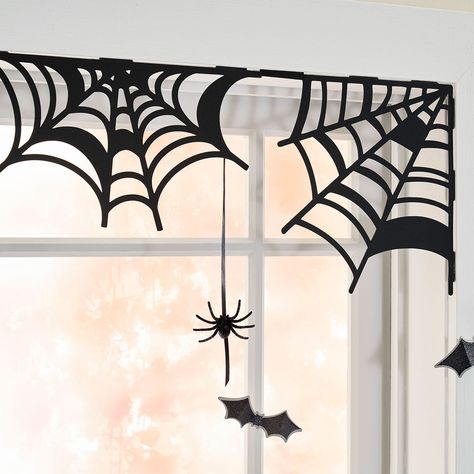 Spider Web Halloween Décor | Projects | Michaels Spiderweb Window, Spider Web Window, Handmade Halloween Decorations, Spiders Halloween, Halloween Window Clings, Scary Haunted House, Halloween Window Decorations, Adornos Halloween, Project Steps