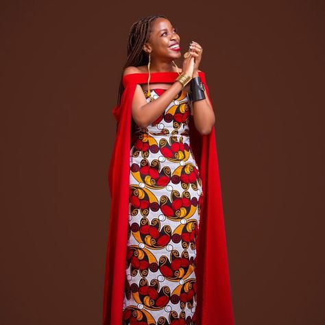 Black Goddes African Print Ankara Gown /Evebing African print gown/ Red Kitenge gown long * * #blackgirlswhoblog #blackfashionblogger #melaninbloggers #stylewatchmag #thecreatorclass #postitfortheaesthetic #artofvisuals #fashionblogger #fashioninspo #lookdujour #ankarafashion #styleinspiration #outfitideas4you #effortlesschic #minimalchic #lestyleàlafrançaise #blogueusemode #minimalfashion #neutralstyle #whowhatwearing #wiwt #whatiwore Red Ankara Dress Styles, Modern Traditional Outfits African, Long Kitenge Dress Designs, Maasai Dress Designs, Kitenge Fashion Long Dresses, Ankara Dress Styles Gowns Classy For Weddings, Maasai Dress, Car 2023, Kitenge Designs