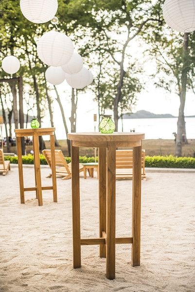 Beach wedding reception cocktail hour idea - wood high boy tables on the sand, white paper lanterns and small glass votives  {Stories Wedding Photography Costa Rica} Beach Cocktail Hour, Cocktail Hour Seating, Summer Beach Cocktails, Costa Rica Beach Wedding, Wedding Reception Cocktail, Diy Cocktail Table, Wedding Reception Cocktail Hour, Wedding Cocktail Tables, Cocktail Table Decor