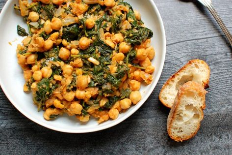 Spanish tapas don't get better than these easy, stewy garbanzos and greens: a healthy vegan chickpea recipe with earthy flavor that takes 15 minutes to make. Cook drained chickpeas with spices, onion, garlic, tomato, and spinach or kale for a delicious snack, side, or even dinner. Classic, healthy, and satisfying. . . . . . #chickpeasalad #tapasrecipes #spanishrecipes #chickpearecipes #veganrecipes #vegan Vegan Chickpea Recipes, Chickpea Recipe, Vegan Chickpea, Tapas Recipes, Spanish Tapas, Chickpea Recipes, Chickpea Salad, Vegan Recipe, Vegan Recipes Healthy