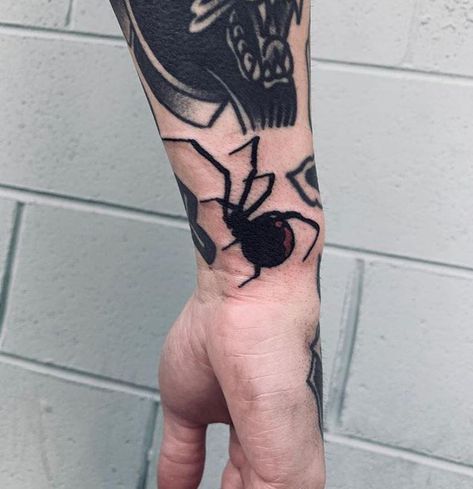 Black widow gap filler on me by Tony Nos at Lakeside Tattoo Co Richmond VA. Edgy Traditional Tattoos, Wrist Filler Tattoo, Traditional Black Widow Tattoo, Filler Tattoo Ideas Gap Men Arm, Gap Filler Tattoo Black And Grey, Filler Tattoo Ideas Gap Men, Tattoo Gap Filler Ideas, Small Gap Filler Tattoo, Small Filler Tattoos