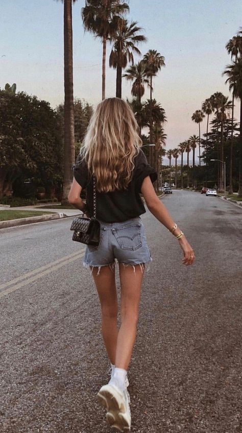 Marie von Behrens wearing Cutoff Denim Shorts by Re/Done