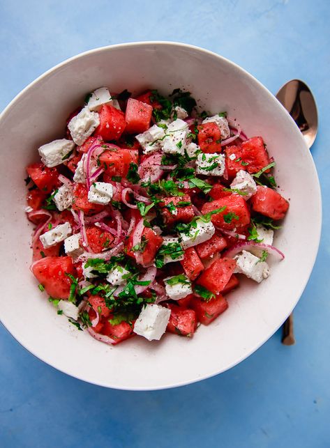 You may not be able to stop once you dive into this bright and fresh Mediterranean watermelon salad. Sweet cubes of watermelon are gently tossed with creamy feta, thinly sliced onion and a simple sumac citrus dressing that makes all the bold flavors pop. Garnish the watermelon feta salad with a healthy amount of fresh mint and basil for a spectacular and gorgeous summer salad. #watermelonfetasalad Watermelon Feta Mint Salad, Moqueca Recipe, Watermelon And Feta Salad, Watermelon Mint Salad, Parmesan Crusted Zucchini, Veggie Bites, Greek Quinoa Salad, Sliced Onion, Quick Pickled Onions