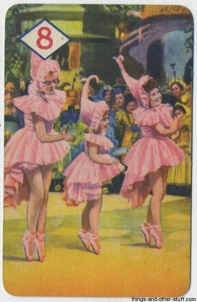 They represent the Lullaby League and they wish to welcome Dorothy Gale to Munchkin Land. Artwork from the 1940 Castell Brothers card game for "The Wizard of Oz." Munchkins Wizard Of Oz, Lullaby League, Wizard Of Oz Munchkins, Munchkin Costume, Munchkin Land, Wizard Of Oz Quotes, Wizard Of Oz 1939, Rainbow Road, Dorothy Gale