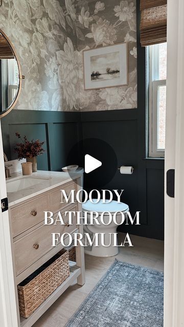 Linsey Woods | Home Decor on Instagram: "Save for your next project! 🫶🏼 This combo feels like the perfect mix of bold and fun but still sophisticated 🤭 Wallpaper is peel + stick so I wouldn’t recommend for a full bathroom with the moisture —but it’s been perfect for a powder bath! 🍃" Dark Floral Bathroom Wallpaper, Black Vanity Powder Room, Powder Room With Window, Paint And Wallpaper Combo, Moody Half Bathroom Ideas, Dark Half Bath, Half Bath With Wallpaper, Powder Room Wainscoting, Half Bath Wallpaper Ideas