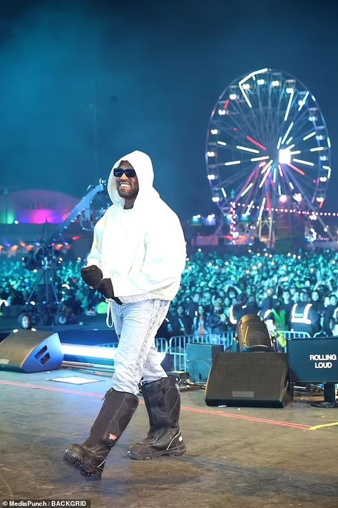 Kanye West makes surprise cameo at Rolling Loud California concert and performs five songs | Daily Mail Online Rolling Loud California, Rolling Loud Concert, Kanye West Performing, Kanye West Concert, White Hooded Sweatshirt, Rolling Loud, Light Jeans, Black Gloves, Kanye West