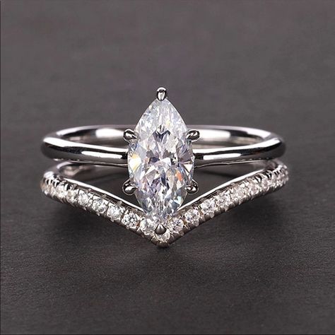 This Ring Set Is Absolutely Stunning! Two Piece Set Features: 925 Stamped Sterling Silver With Rhodium Plating To Enhance Its Color. Main Stone Is A Full 2ct 5a Cz V Shaped Ring Has Gorgeous Pave Simulated Diamonds This Ring Set Has Incredible Clarity And Sparkle! Has The Look Of Real Diamonds This Is A High Quality Forever Ring Set That Will Keep Its Sparkle And Shine All Sizes Available From 5 -11 Includes Beautiful Gift Box Other Listings: Engagement Rings Diamond Bands 10k 14k 18k Gold White Gold Platinum Rose Gold Earrings Necklaces Bracelets Bridal Promise Wedding Prom Emerald Sapphire Micro Pave Natural Gemstones Vintage 925 Sterling Silver Classic Retro Contemporary Pear Marquise Engagement Ring Set, V Shaped Ring, Forever Ring, Diamond Band Engagement Ring, Engagement Rings Diamond, Platinum Rose Gold, Engagement Rings Marquise, Engagement Wedding Ring Sets, Engagement Ring Sizes