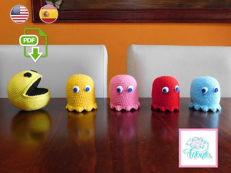 Keep Calm and Om Nom With This Fun Pac-Man Amigurumi Pattern Set For Crocheters #crochet #amigurumi #pacman Pacman Crochet Pattern, Crochet Game Controller Pattern, Pacman Crochet Pattern Free, Pac Man Crochet Free Pattern, Crochet Pacman, 90s Crochet, Pacman Ghost, Vendor Ideas, Crochet Tiny