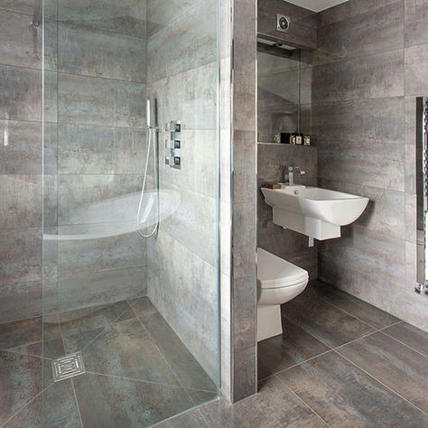 Dark grey tiled bathroom with walk-in shower | Bathroom decorating | housetohome.co.uk | Mobile Bathroom Gray Cabinets, Wood Shower Tile, Dark Grey Tile Bathroom, Slate Bathroom Floor, Small Grey Bathrooms, Grey Bathroom Floor, Slate Bathroom, Gray Bathroom Walls, Bathroom Gray