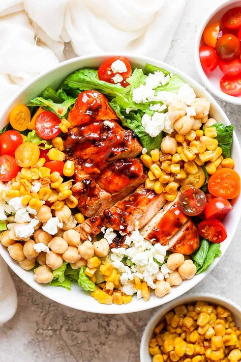 This is the ultimate bbq chicken salad made with all the summer ingredients - romaine, cherry tomatoes, corn, garbanzo beans, bbq chicken, and an avocado ranch dressing. Chicken Garbanzo Bean Recipes, Garbanzo Bean Chicken Salad, Salad With Garbanzo Beans Healthy, Mediterranean Chicken Avocado Corn Salad, Garbanzo Salad, Garbonzo Bean Salad, Bbq Chicken Breast Recipe, Grilled Buffalo Chicken, Bbq Chicken Breast