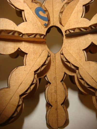 Cardboard Snowflake : 4 Steps - Instructables Cardboard Snowflakes, Diy Snowflake Decorations, Yarn Crafts For Kids, Diy Paper Flowers, 3d Snowflakes, Snowflake Template, Snow Flakes Diy, Paper Flower Crafts, Sculpture Projects