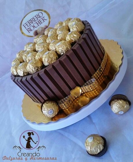 Ferrero rocher and kitkat cake Coconut Ferrero Rocher Cake, Cakes With Ferrero Rocher, Ferrero Rocher Cake Decorating Ideas, Birthday Cake With Ferrero Rocher, Ferrero Rocher And Strawberry Cake, Kitkat Cake Ideas, Cake Ferrero Rocher, Ferrero Rocher Cake, Kitkat Cake