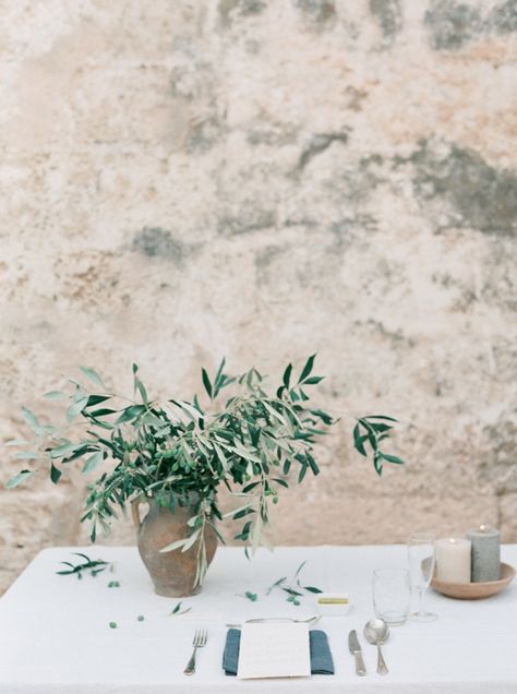 Mini Olive Trees Wedding, Wedding Table Olive Leaves, Olive Leaves Wedding Centerpieces, Italian Wedding Bouquet Olive Branches, Olive Leaves Centerpiece, Simple Tuscan Wedding, Bouquet With Olive Leaves, Simplistic Wedding Decor, Organic Tablescape