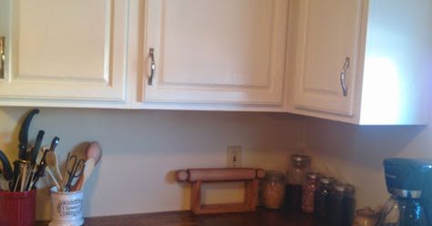 I'll show you how anyone can easily add moulding to their current kitchen cabinets so that it looks like it's always been there for around $20.00!
 
My cabinets started out as awful stock kitchen cabinets, a foot and a half of dead space above them.  Now they are gorgeous white cabinets with crown moulding that looks custom, plus I only spent about $20.00, used extremely common tools, and did it myself in a couple hours.
 
Using a miter box, a very sharp bread knife, construction adhes… Trim For Kitchen Cabinets, Distressed Kitchen Cabinets, Cabinet Refresh, Stock Kitchen Cabinets, Distressed Kitchen, Clean Kitchen Cabinets, Wood Putty, Oak Kitchen Cabinets, New Kitchen Cabinets