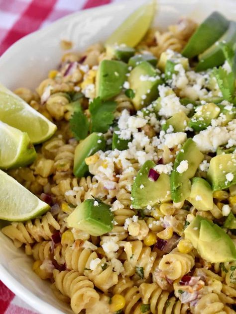 Elote Pasta Salad is a fun take on the flavors of traditional Mexican Street Corn made with corn kernels and tossed with pasta in a creamy dressing. This simple and flavorful dish is great for any occasion. Elote Pasta Salad, Elote Pasta, Mexican Street Corn Salad, Creamy Dressing, Rotini Pasta, Bbc Good Food, Mexican Street Corn, Street Corn, Mexican Street