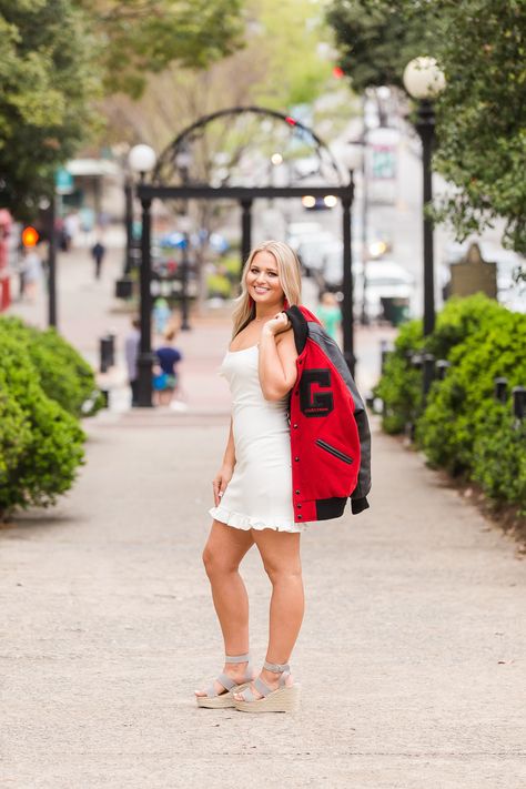 UGA letterman jacket with the arch | Georgia Senior photos Poses With Letterman Jacket, Senior Picture With Letterman Jacket, Senior Pics Letterman Jacket, Senior Photos Letterman Jacket, Letterman Senior Pictures, Senior Pictures With Letterman Jacket, Letterman Jacket Photoshoot, Senior Pictures Letterman Jacket, Letterman Jacket Senior Pictures