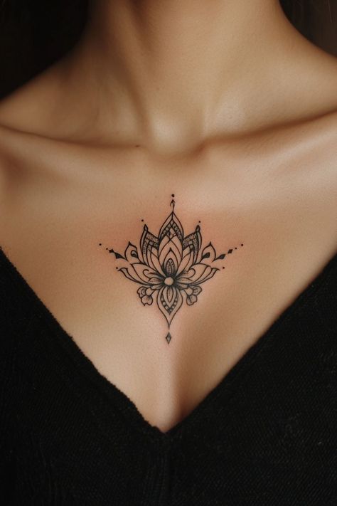 Mesmerizing Female Chest Tattoo Designs 🔥 Check more at https://ideatatto.com/female/mesmerizing-female-chest-tattoo-designs-%f0%9f%94%a5/ Lotus Chest Tattoo For Women, Anahata Tattoo, Minimalist Chest Tattoo, Feminine Chest Tattoo For Women, Throat Tattoos Women Simple, Cute Chest Tattoo Female, Center Chest Tattoo Female, Chest Tattoo Ideas For Women, Female Chest Tattoo Ideas