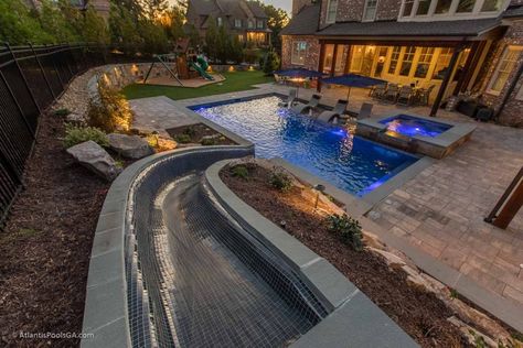 Pool Slides - ATLANTIS POOLS & SPAS, LLC Modern Pool Design With Slide, Modern Pool Grotto Ideas, Pool With A Slide, Rectangle Pool With Slide, Pool Design For Small Yards, Pool Design Ideas Layout, Modern Pool With Slide, Inground Pool With Slide, Pools With Slides