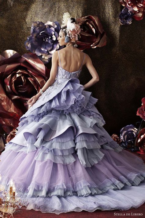 While doing some research for an upcoming blog I came across a line of haute couture wedding dresses by Japanese designer, Stella de Libero.  Now, this collection is not for the traditional or timi… Ian Stuart, Haute Couture Wedding Dress, Michael Cinco, Purple Wedding Dress, Stella Dress, Glamorous Style, All Things Purple, Wedding Dress Couture, Couture Wedding