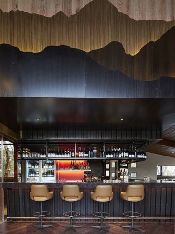 Grant Amon's Astra Lodge features wood veneer panelling to match its mountainous setting (photo: Peter Bennetts). Mountain Restaurant Design, Restaurant Feature Wall, Mountain Restaurant, Bar Restaurant Design, Architecture Restaurant, Diy Deck Furniture, Fall Dining Room, Autumn Dining, Design Café