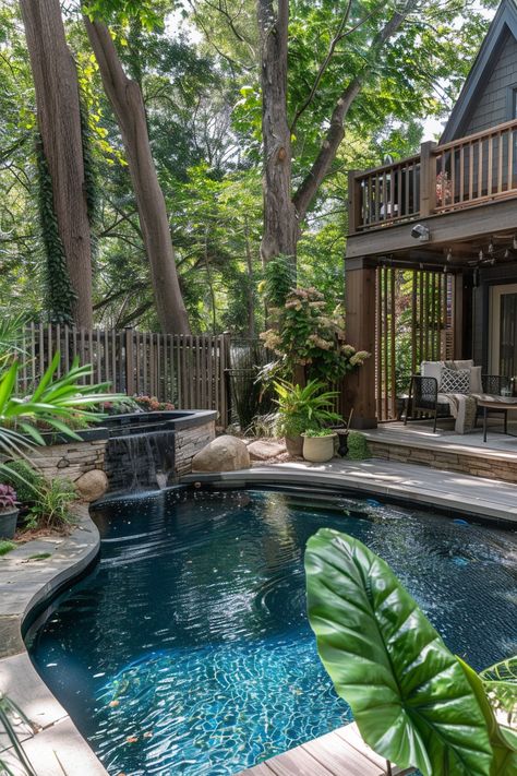 Backyard with a patio, lush plants, and a small pool featuring a cascading stone waterfall. Tall trees provide shade and a serene, forest-like ambiance. Split Level House Exterior, Small Pool Ideas, Small Backyard Pool Ideas, Small Backyard Pool, Backyard Pool Ideas, Tiny Backyard, Amazing Pools, Pool Play, Dream Backyard Pool