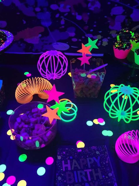 Let’s GLOW Birthday Party | CatchMyParty.com Cosmic Bowling Birthday Party, Glow Theme Party Games, Neon Glow Party Food, Neon Cowgirl Party, Glow Party Centerpieces, Neon Centerpieces Ideas, Diy Glow Party Decorations, Neon Glow Party Ideas, Neon Party Food