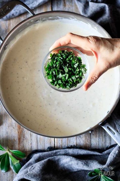 Alfredo basil sauce is an easy recipe that is creamy, cheesy, and so simple to learn how to make. With the help of some garlic, Parmesan, heavy cream, and fresh basil, you'll have a restaurant quality sauce that tastes amazing on fettuccine or tortellini. | www.savortheflavour.com #savortheflavour #alfredosauce #pastasauce Basil Alfredo Sauce, Alfredo Sauce Recipe Easy Heavy Cream, Fettuccine Sauce, Alfredo Sauce Recipe Without Heavy Cream, Fresh Basil Recipes, Roasted Grape Tomatoes, Tortellini Alfredo, Alfredo Sauce Recipe Easy, Cooking With White Wine