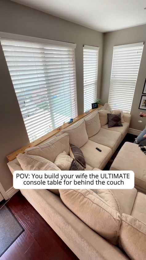 We wanted a place to charge our phones while lounging on the couch. And of course I can’t just build a simple table for behind the couch;… | Instagram Couch Table Behind, Broom Cabinet, Behind The Couch, Diy Wooden Projects, Wine Glass Holder, Simple Table, Snack Tray, Glass Holder, Build Something