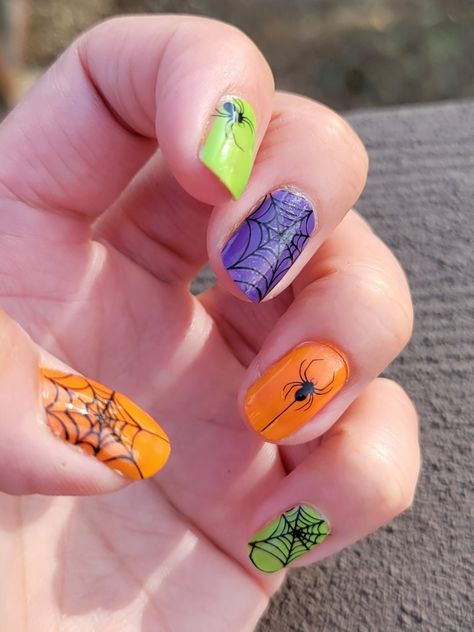 Multi Color Halloween Nails, Purple Green Orange Nails, Orange Purple Green Nails, Color Street Halloween Mixed Mani, Orange Black Purple Green Halloween Nails, Orange And Green Halloween Nails, Purple And Orange Nails Halloween, Halloween Nails Green And Purple, Halloween Nails Color Street