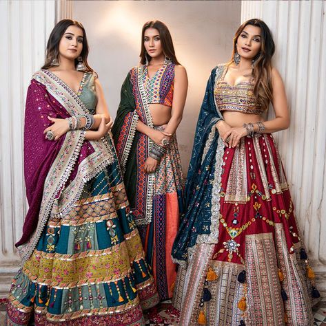 Riwaayat Collection 2022, Celebrating the colours of various festivals. Our multi-coloured lehengas are intricately embroidered and embellished with cowry shells, mirror, and thread work. Featuring mashru silk lehengas with embroidered borders and Uppada dupatta. A new chapter embracing our culture & treasure of our crafts with contemporary designs. Multi Colour Chaniya Choli, Navratri Colours 2023, Navratri Collection 2023, Multi Colour Lehenga, Colourful Lehenga, Dandiya Dress, Chiffon Blouses Designs, Garba Dress, Silk Lehengas