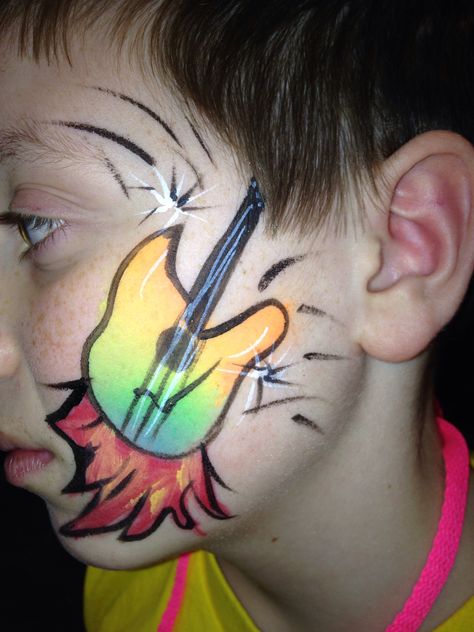 Rock star birthday party for boys- he asked for a tie dyed guitar and flames quick face painting Rock Star Face Paint, Rockstar Face Paint, Quick Face Painting, Rock Star Birthday Party, Rock Star Birthday, Rockstar Birthday Party, Star Birthday Party, Rock Star Party, Star Birthday