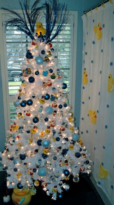 Awesome rubber ducky tree! #RhodeIslandBathroom Duck Christmas Tree, Rubber Ducky Bathroom, Duck Christmas, You're The One, Christmas Bathroom, White Tree, Rubber Ducky, Noel Christmas, Christmas Tree Themes