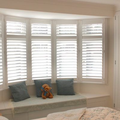 White wooden bay window shutters Bay Window Decor, Bay Window Design, Living Room Bay Window, Bay Window Treatments, Bay Window Living Room, Indoor Shutters, White Shutters, Interior Window Shutters, Interior Shutters