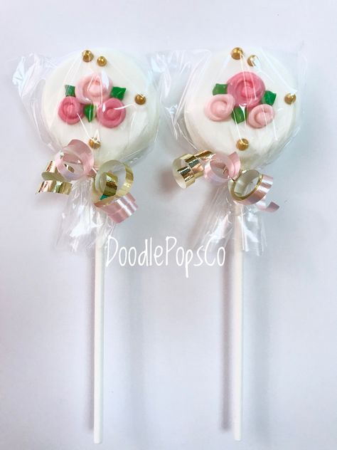 Cute little cookie pops made just for you! Includes one dozen floral themed pops. They will be made in the colors shown. If you would like them in colors other that what is shown just let me know in the seller note at checkout. They will be individually wrapped with cello bags & tied with matching ribbon. Pretzel rods in this same design are also available at my shop. Please give the date that you will need your order. They will be made & shipped closer to your party date. They should be Marshmallows Pops, Oreo Cookie Pops, Baby Shower Party Favor, Amazing Food Decoration, Baby Shower Favors Girl, Dessert Packaging, Covered Oreos, Oreo Pops, Summer Cookies