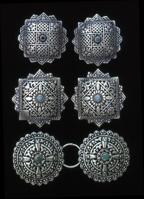 Bhutan - 'Koma', repousse brooch used to secure woman’s traditional Bhutanese dress (‘Kira') Bhutan Jewellery, Bhutanese Dress, Bhutanese Jewellery, Secure Woman, Bhutanese Traditional Dress, Kira Aesthetic, Bhutanese Clothing, Bhutan Traditional Clothing, Bhutanese Culture